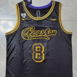 A black and gold jersey with the number 8 on it.