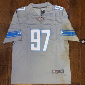 A detroit lions jersey with the number 97 on it.